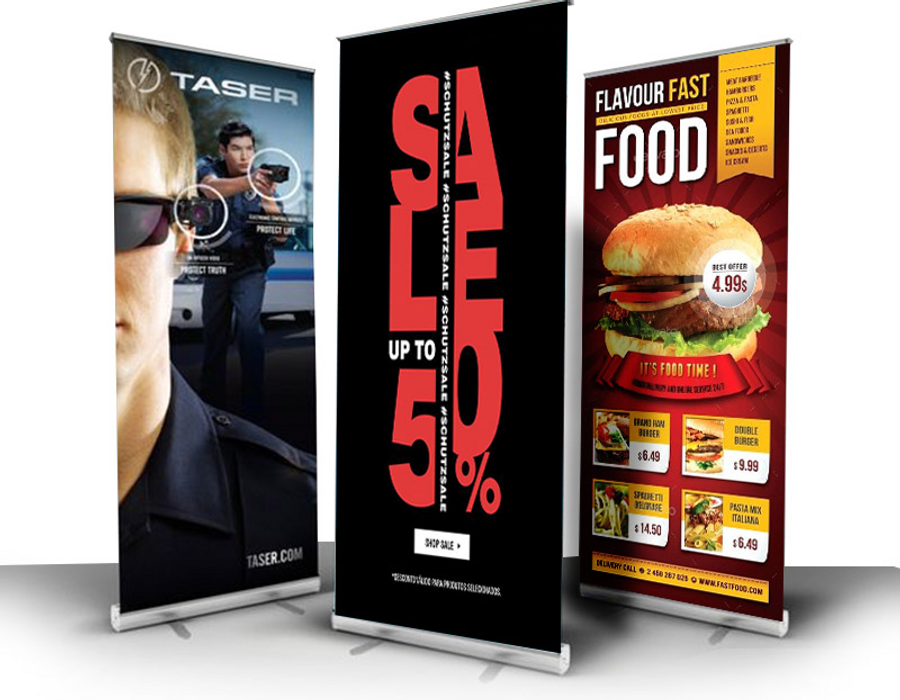 Three retractable banner stand displays for promotions and events